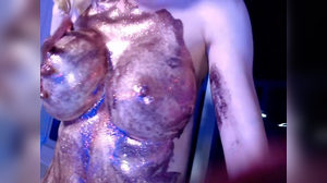 Pouring weird liquids all over her sexy body